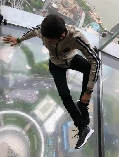 Mid-step on the glass floor